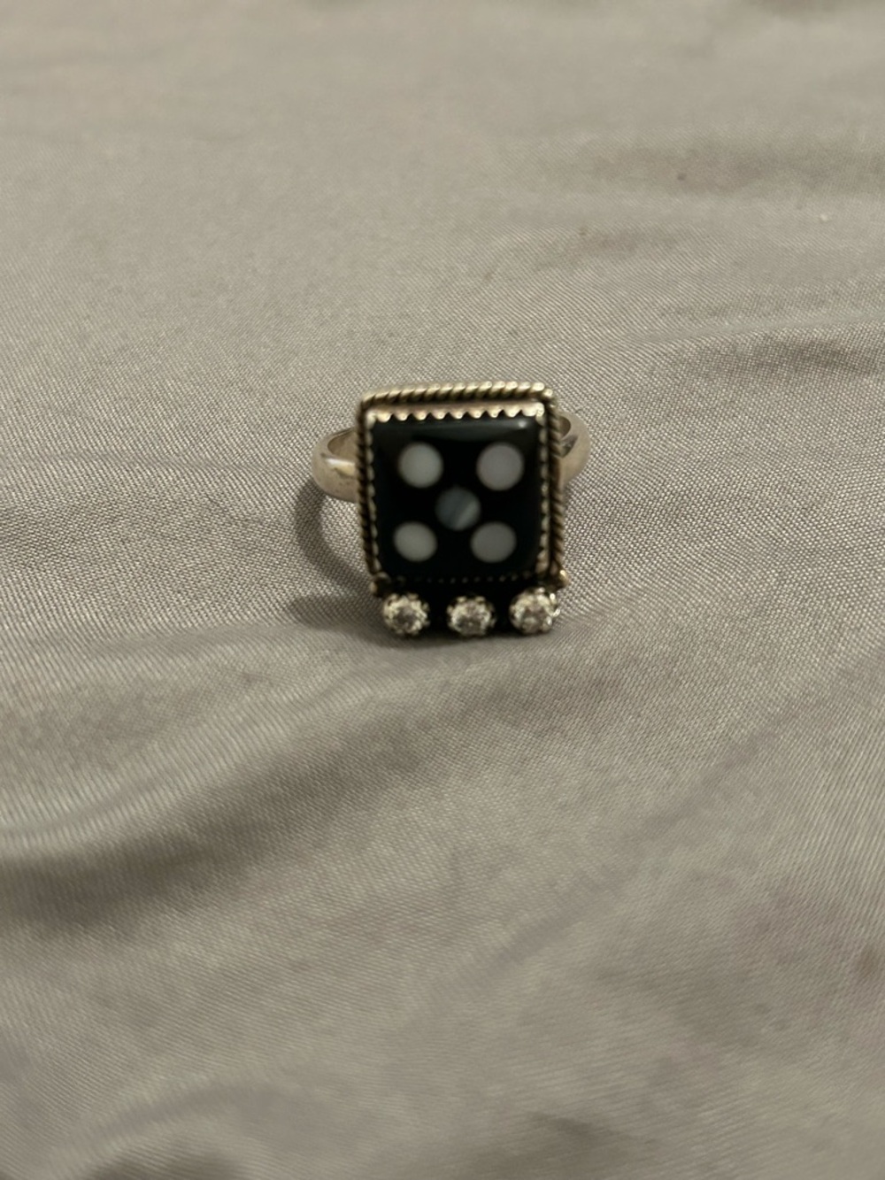 Dice sterling silver ring is stamped with diamonds